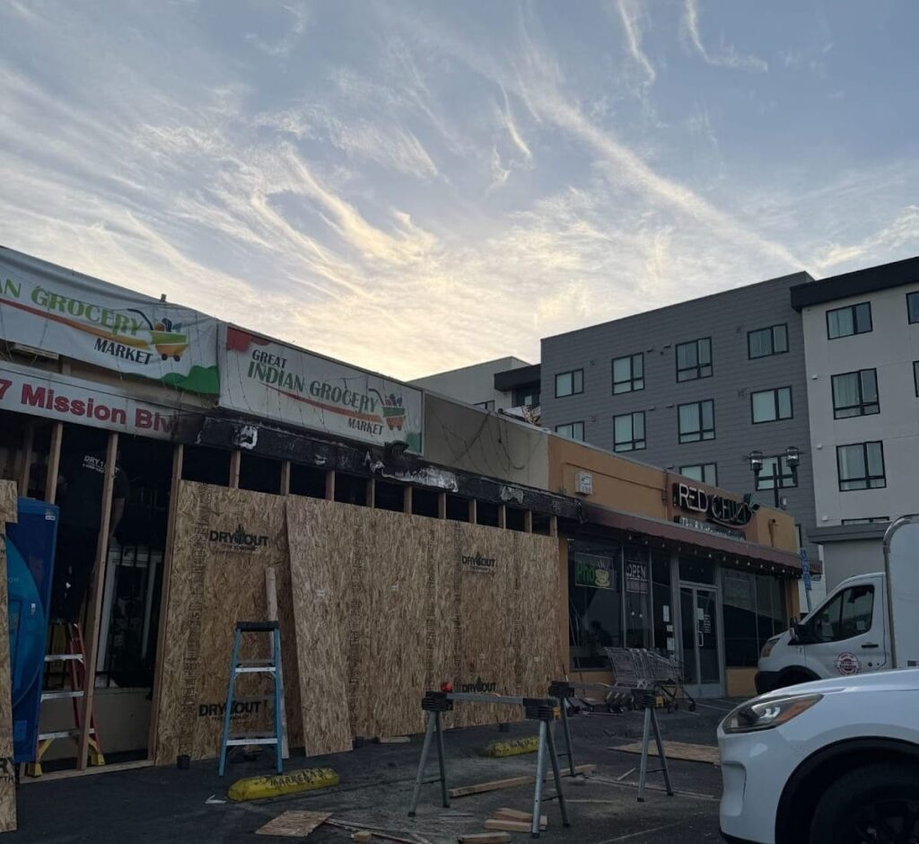 Photograph of fire damage to Great Indian Grocery Market and Red Chili. Courtesy of The Ho Family.